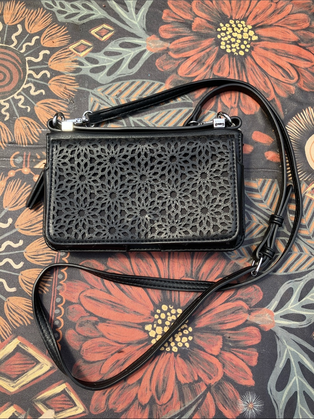 NWOT Cute Madison West Black Crossbody Wallet Bag with Floral Perforated Accent